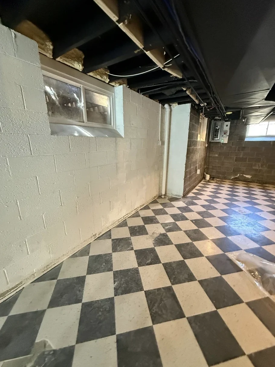 Before — block walls & checkered tile